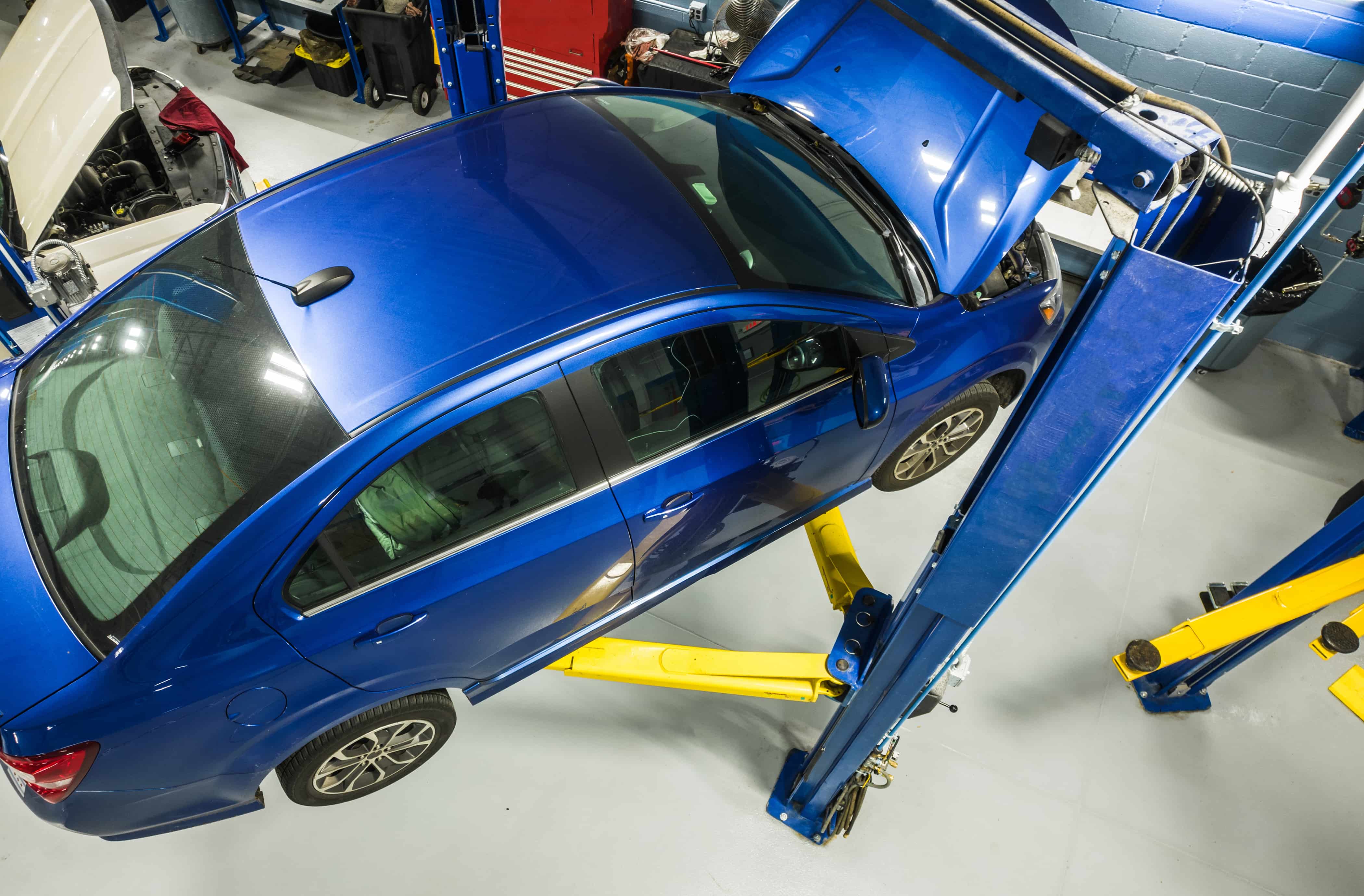 Car Servicing & Repairs in Wollert Professional vehicle suspension service in Wollert - SUV on hydraulic lift for comprehensive undercarriage inspection and repairs